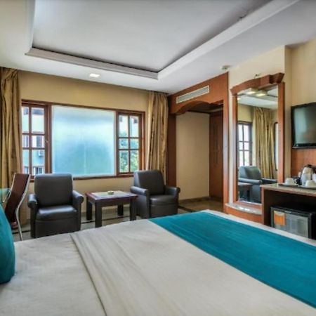 Golden Metro Hotel Bangalore Exterior photo